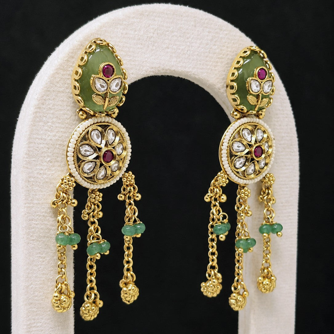 Kundan Medallion Tassel Earrings
